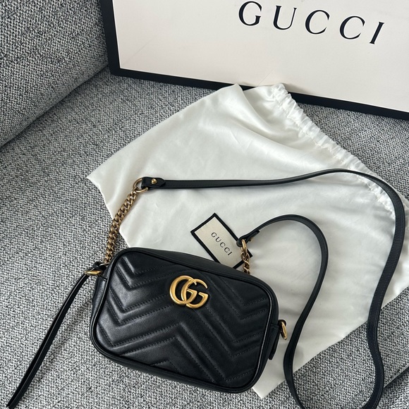 Gucci Handbags - Gucci GG Marmot Matelassé Mini Bag (sold)